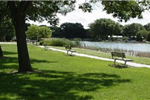 Benches line the walkway at Riverside Park