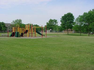 Brightly colored playground equipment at Firemans Park
